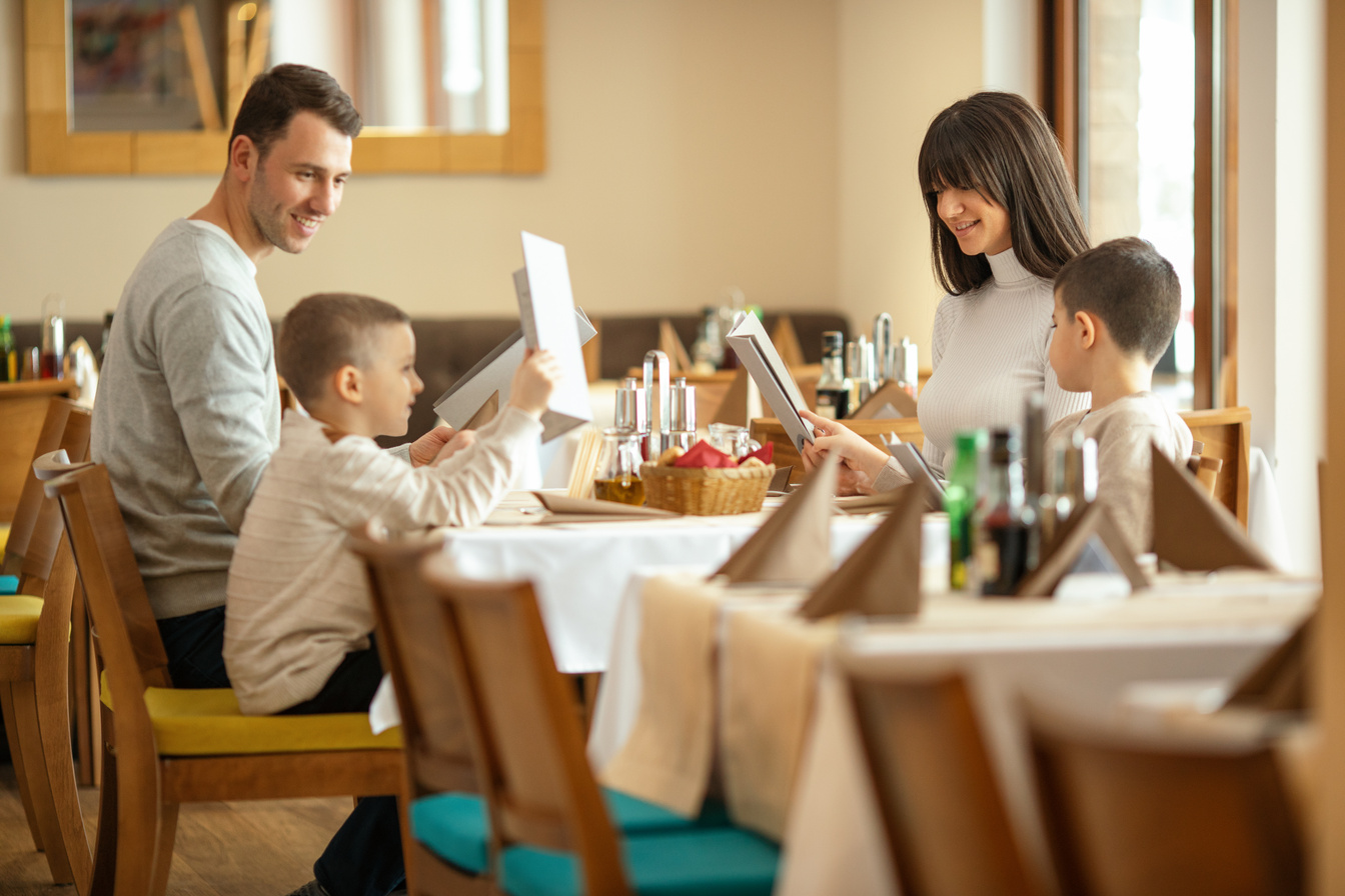 Family at lunch in hotel restaurant